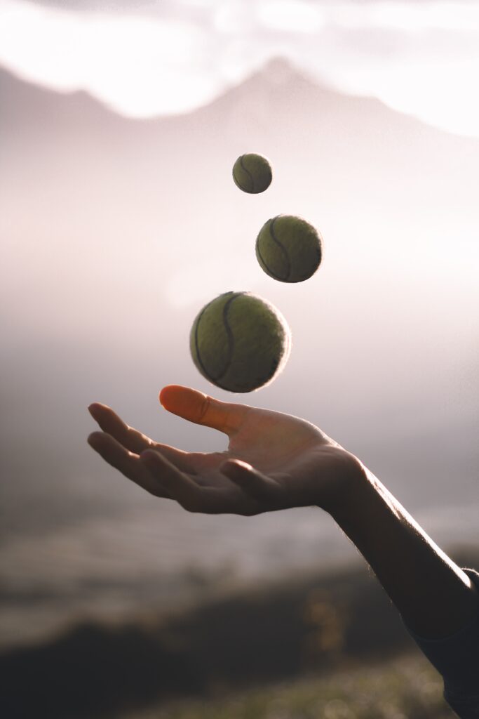 Juggling tennis balls